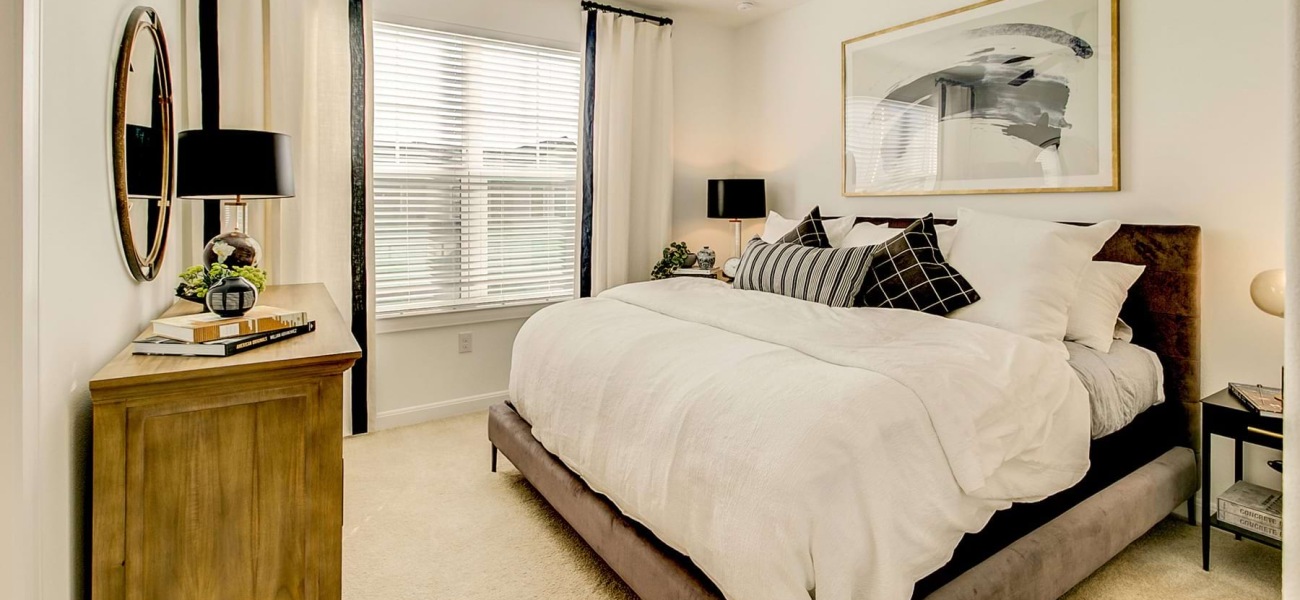 Bedroom with natural lighting and high ceilings Bedroom with natural lighting and high ceilings